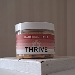 Thrive Hair Skin Nails Supplement - Pink and White Jar